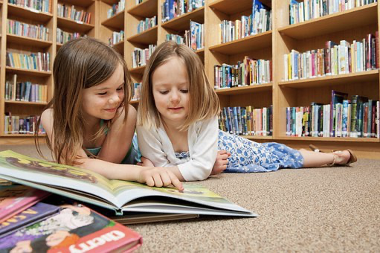 Girls Reading in Library